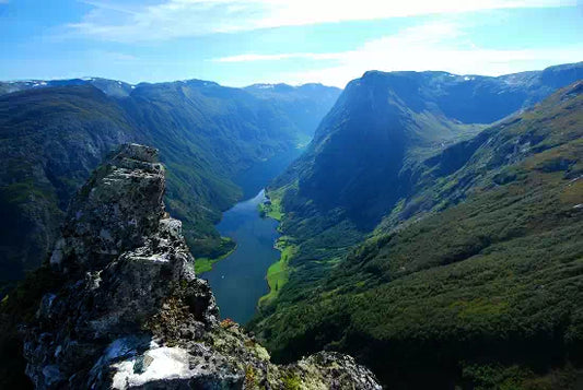 Breathtaking view of a valley with a river and mountains under a clear blue sky, Miss box huge usually.