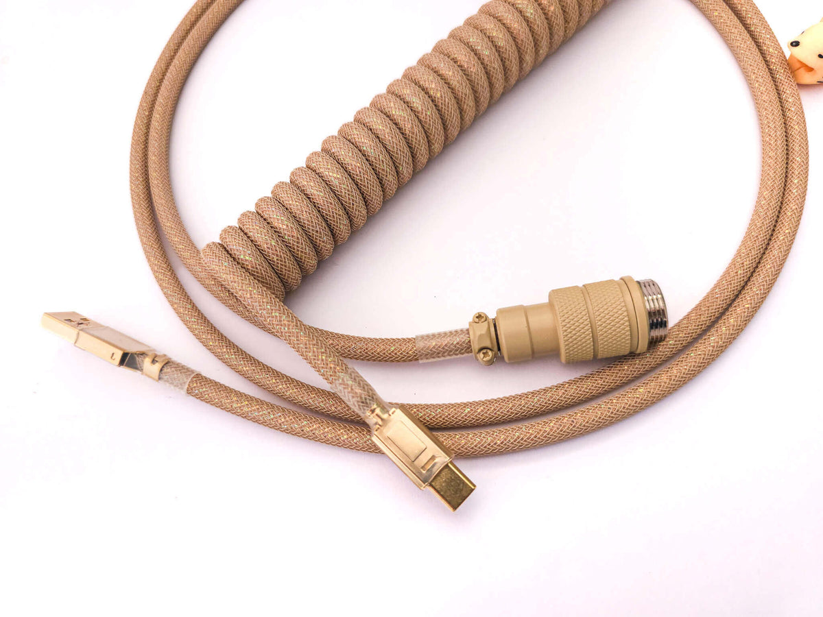 Beige Galaxy keyboard cable with gold USB C to C connectors and beige Aviator