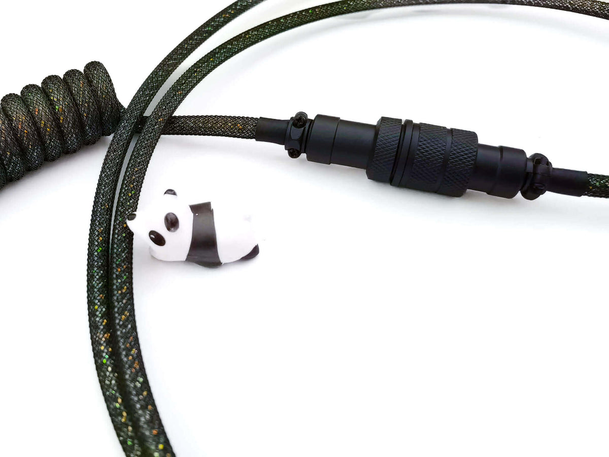Black Aviator Gx16 cable connector on black coil cable