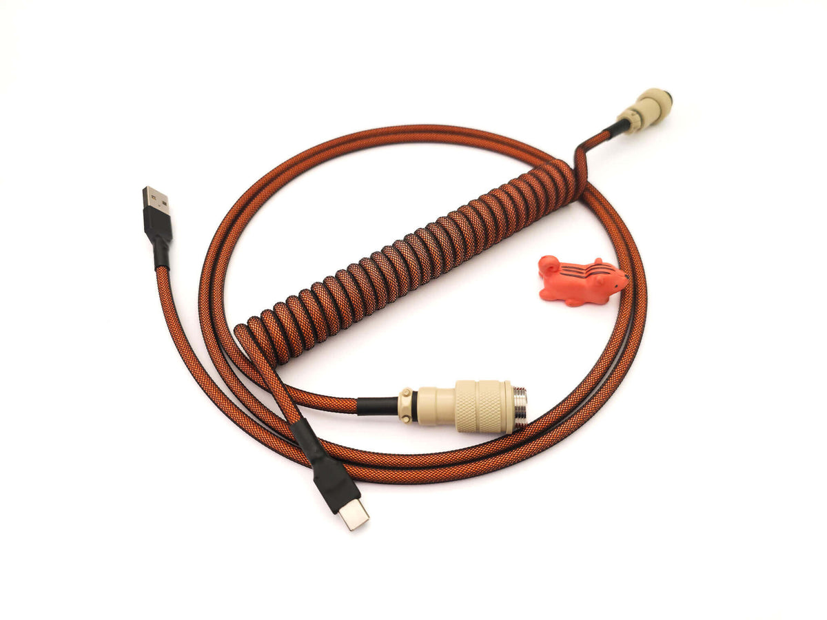 Carbon orange coiled keyboard cable with orange coil, beige Aviator and black heat shrink