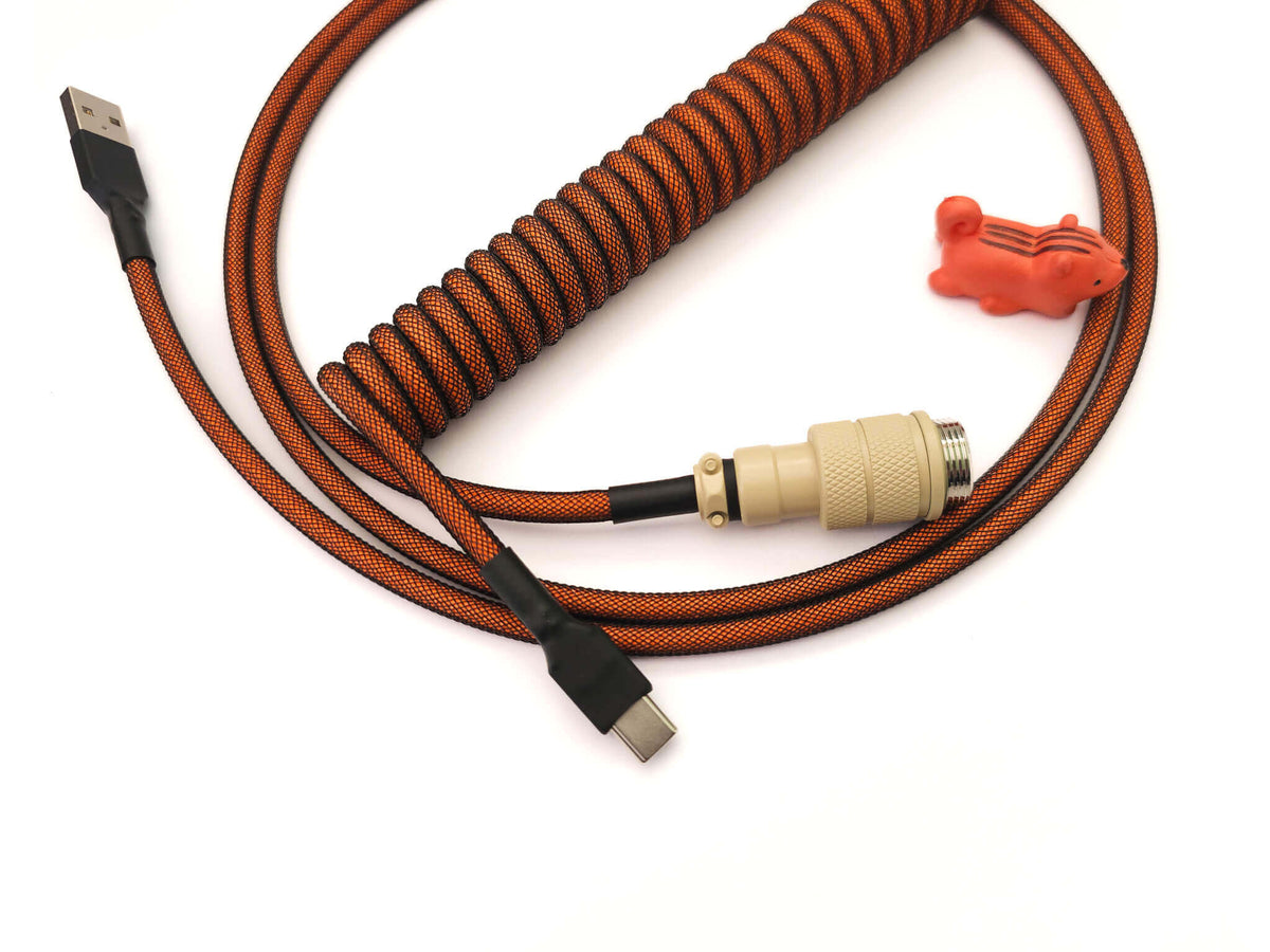 Copper orange keyboard cable with beige Gx16 connector, black heat shrink and USB C connection