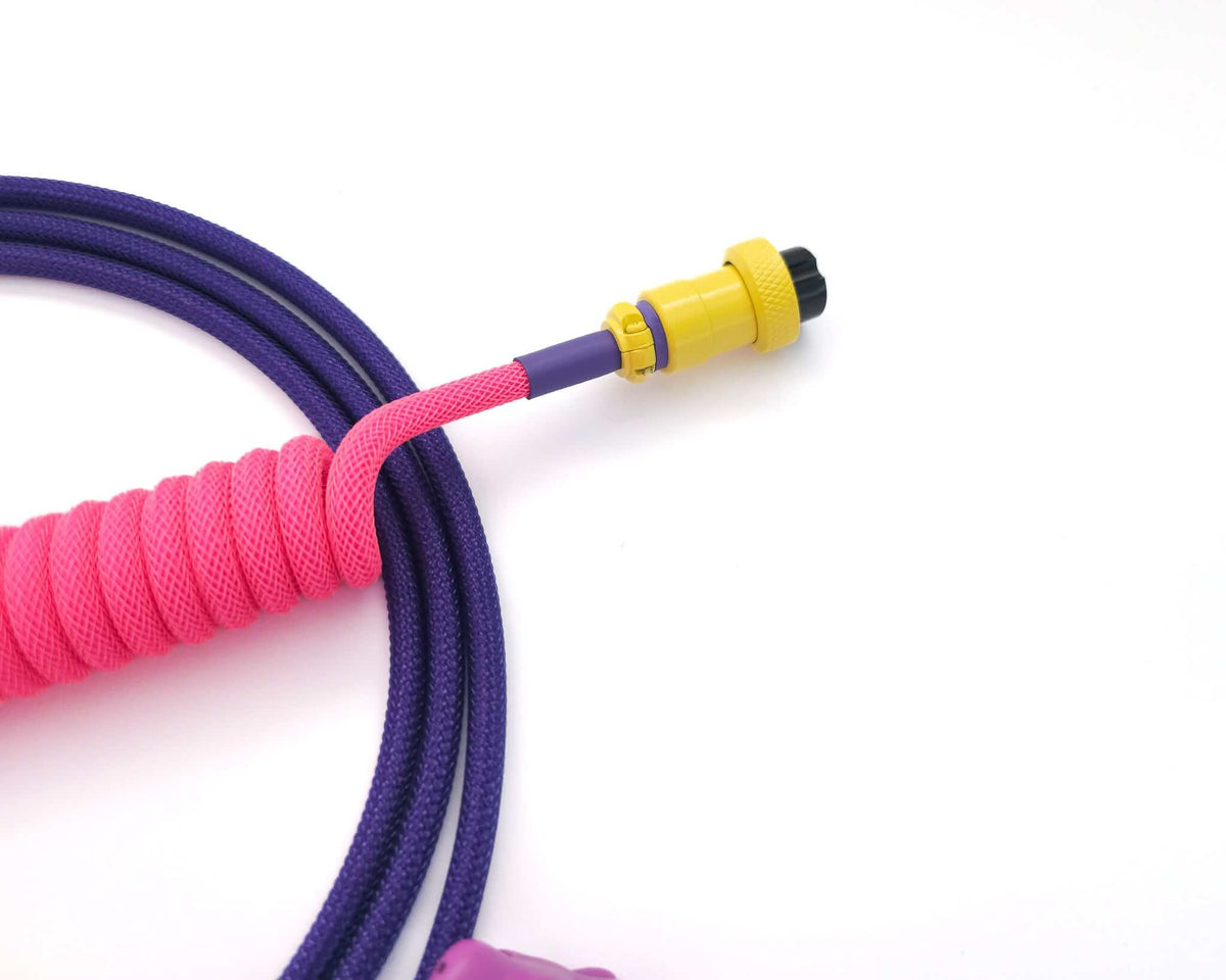Neon Pink coiled keyboard cable with yellow Aviator connector and purple host cable