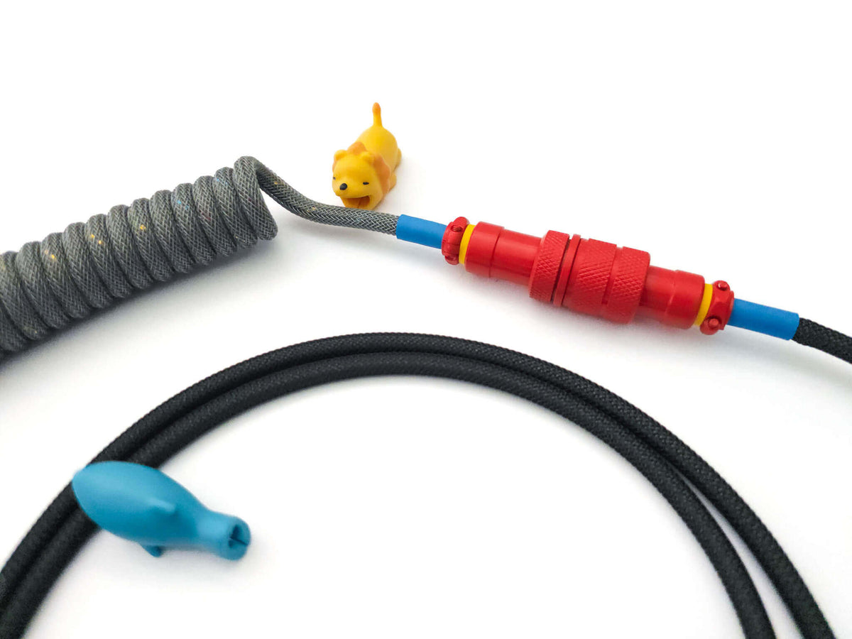 Red Gx16 connector with blue heat-shrink and yellow accents 