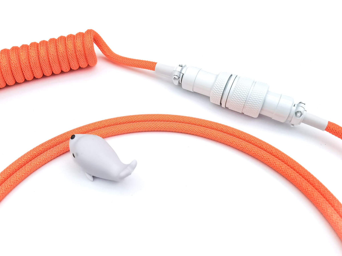 Orange Aviator Gx16 cable with white cable bite and white Aviator connector