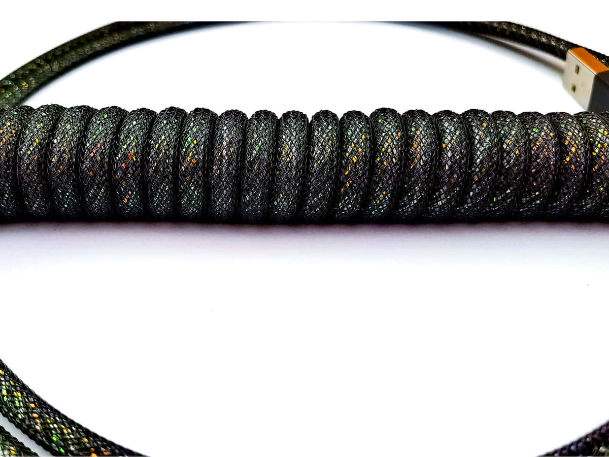Shiny coiled cable with black color and sparkles 