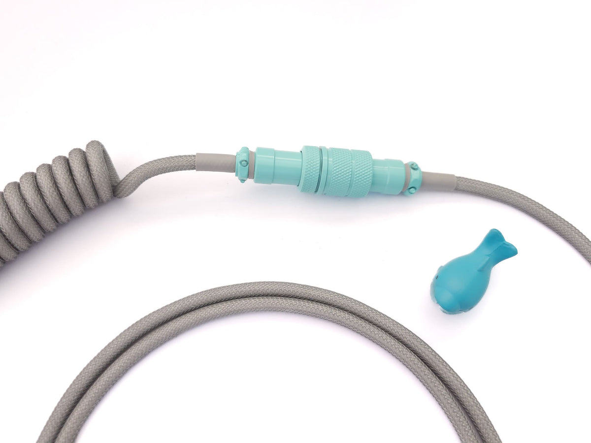 Teal Gx16 Aviator connector on grey coil cable